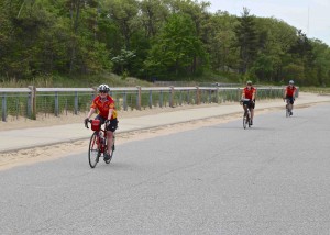 Bicyclists traveling around the entire perimeter of Lake Michigan stopped at the Indiana Dunes.