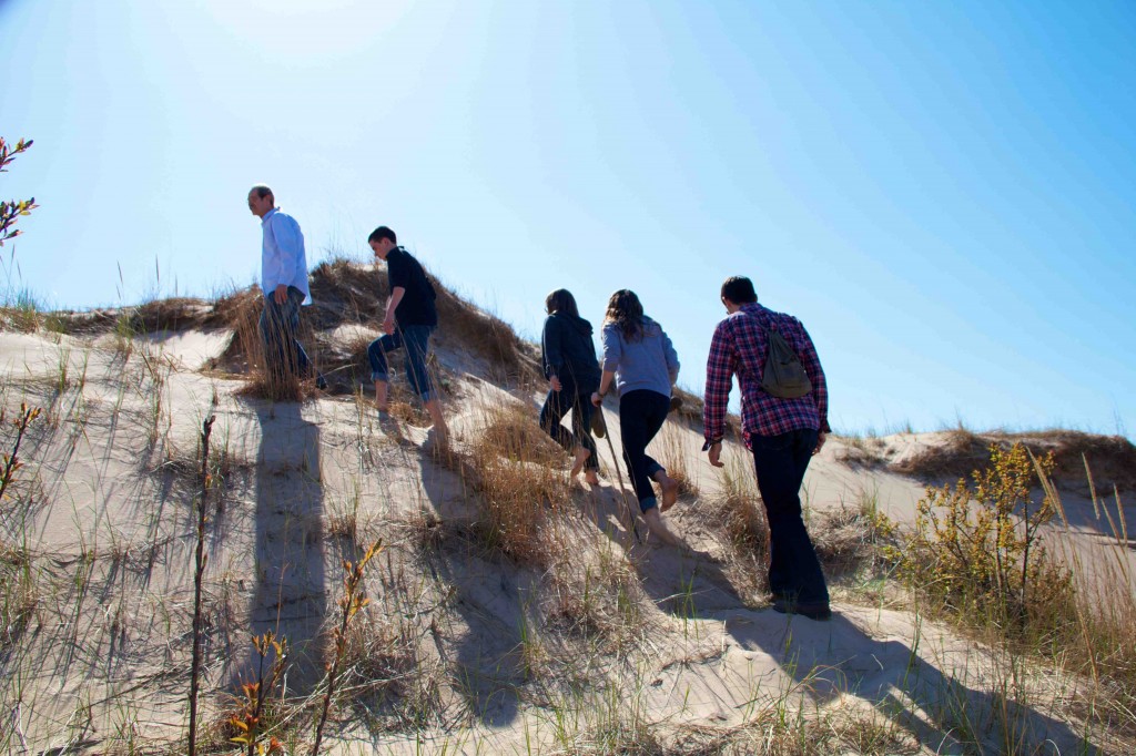 Hiking the dunes. A good time for the whole family.